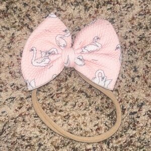 Bow made to match posh peanut Odet